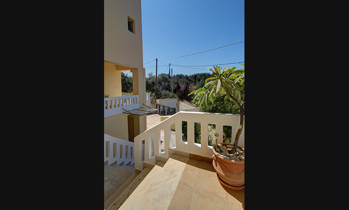 IN A RESIDENTIAL COMPLEX THAT OVERLOOKS THE SEA