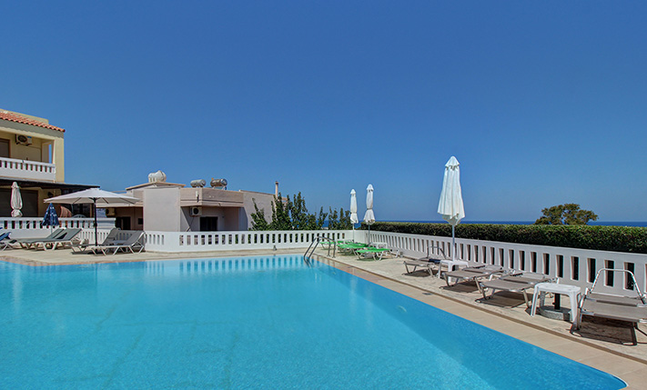 IN A RESIDENTIAL COMPLEX THAT OVERLOOKS THE SEA