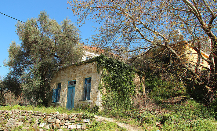 OLD STONE-BUILT HOUSE IN A TRADITIONAL VILLAGE
