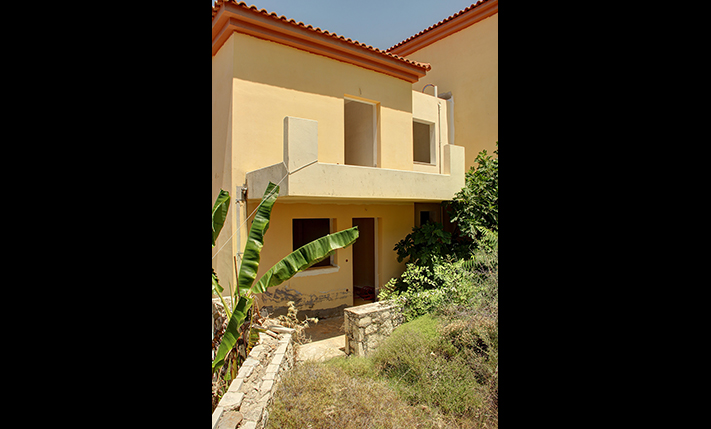 UNFINISHED MID-TERRACED HOUSE WITH SEA VIEWS