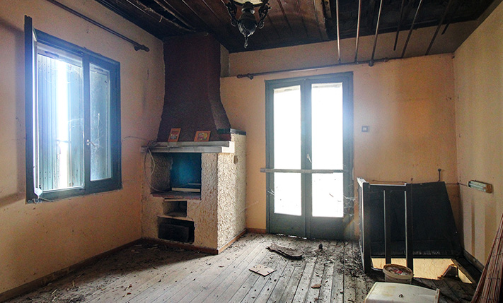 SEMI-CONVERTED STONE BUILDING IN TOURIST REGION