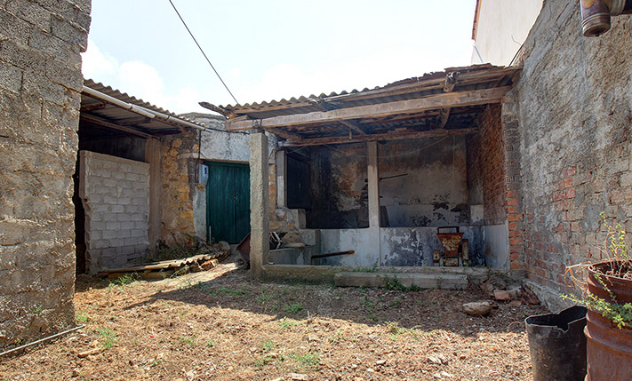 AN OLD STOREHOUSE IN THE VILLAGE CENTRE