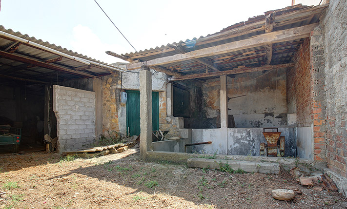AN OLD STOREHOUSE IN THE VILLAGE CENTRE