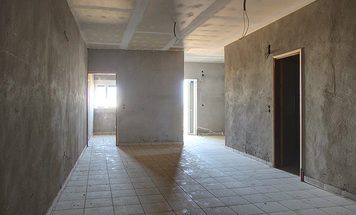 LARGE UNFINISHED BUILDING OF 7 APARTMENTS