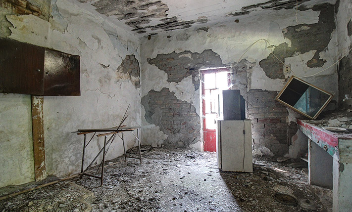 FARM HOUSE IN AN ABANDONED NEIGHBORHOOD