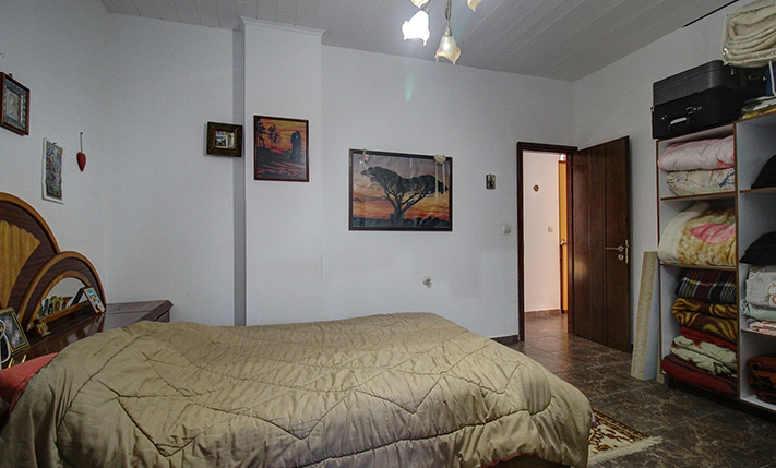 GROUND LEVEL APT WITH AMPLE STORAGE & TERRACES