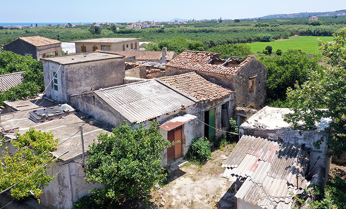 IN AN ABANDONED NEIGHBORHOOD NEAR THE SEA