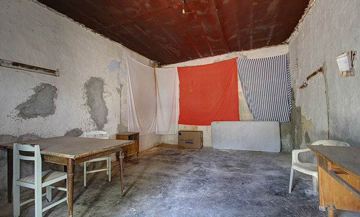 IN AN ABANDONED NEIGHBORHOOD NEAR THE SEA