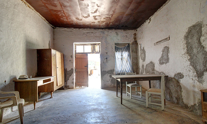 IN AN ABANDONED NEIGHBORHOOD NEAR THE SEA