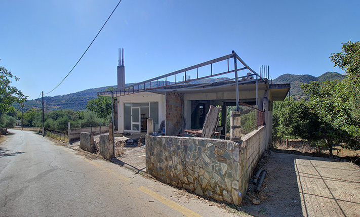 UNFINISHED MIXED-USE BUILDING WITH POTENTIAL