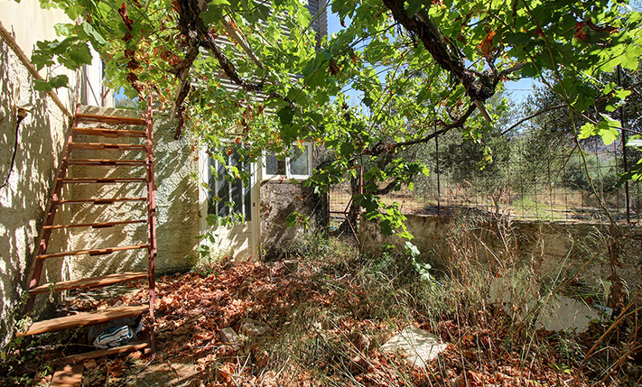 UNFINISHED MIXED-USE BUILDING WITH POTENTIAL