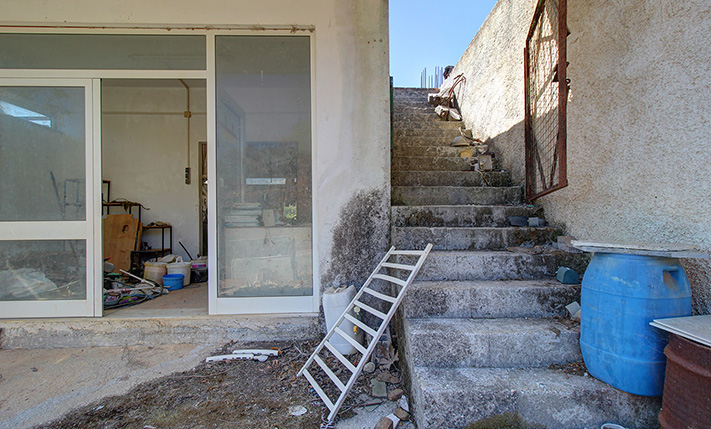 UNFINISHED MIXED-USE BUILDING WITH POTENTIAL