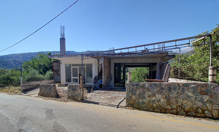 UNFINISHED MIXED-USE BUILDING WITH POTENTIAL