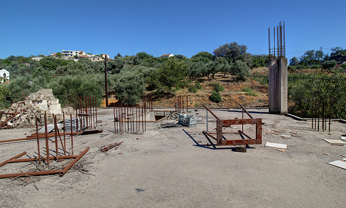 UNFINISHED MIXED-USE BUILDING WITH POTENTIAL