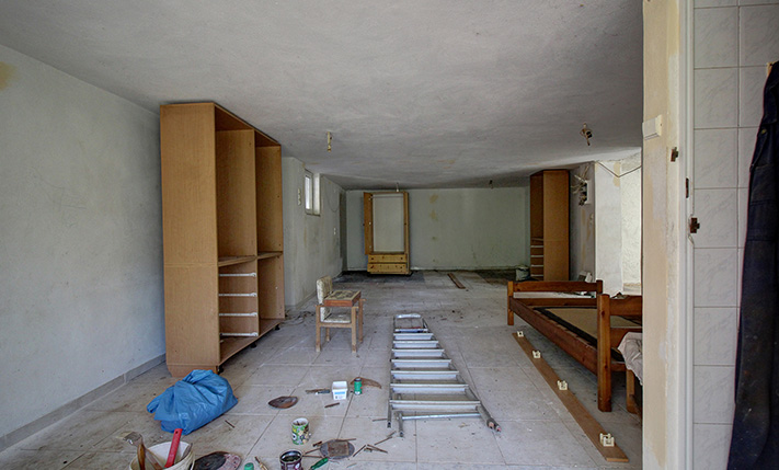 UNFINISHED MIXED-USE BUILDING WITH POTENTIAL