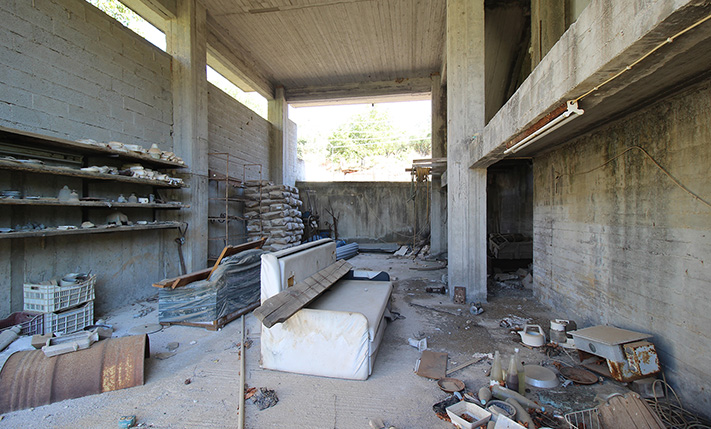 UNFINISHED MIXED-USE BUILDING WITH POTENTIAL