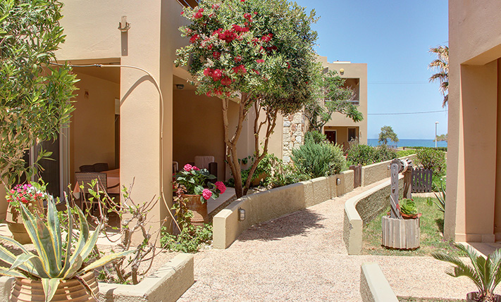 GROUND-LEVEL WITH GARDEN, STEPS FROM THE BEACH