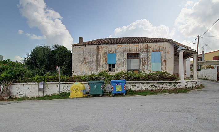 AN OLD KAFENIO ON A SQUARE NEAR THE BEACH