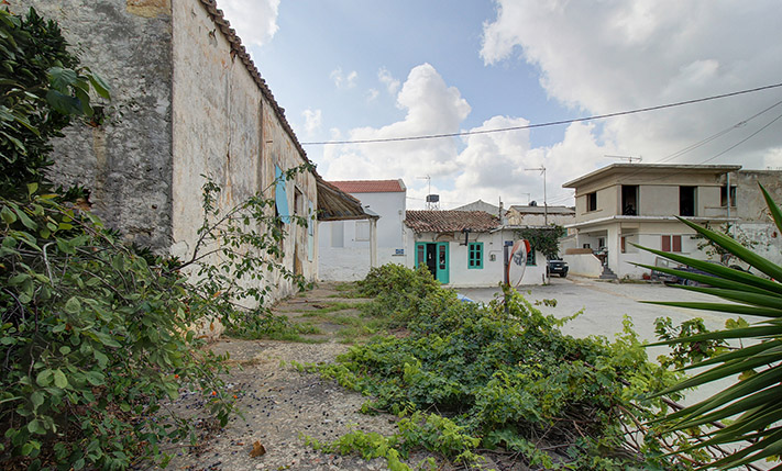 AN OLD KAFENIO ON A SQUARE NEAR THE BEACH