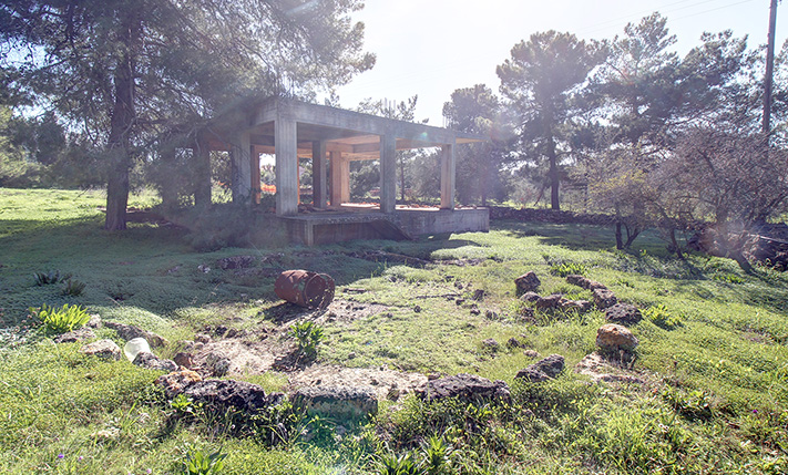 LAND FOR A SMALL COMPLEX WITH UNFINISHED HOUSE