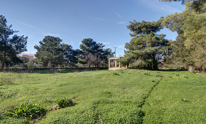 LAND FOR A SMALL COMPLEX WITH UNFINISHED HOUSE