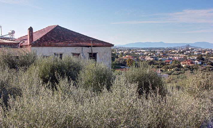 AN OLD OLIVE FACTORY THAT OVERLOOKS THE CITY