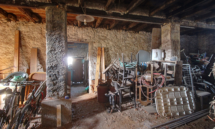 AN OLD OLIVE FACTORY THAT OVERLOOKS THE CITY