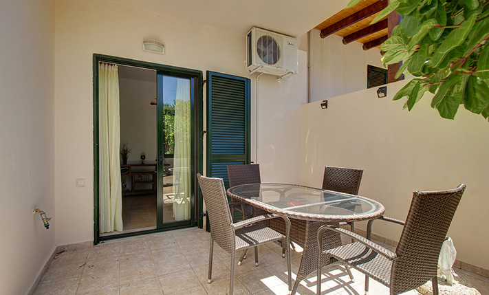 IN A LUSH COMPLEX WITH SPACIOUS SWIMMING POOLS