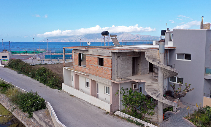 GROUND LEVEL APT & UNCONVERTED TOP FLOOR