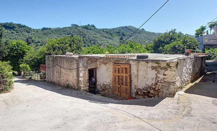 1-LEVEL STONE BUILDING IN VOUKOLIES TOWN CENTER