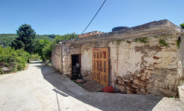 1-LEVEL STONE BUILDING IN VOUKOLIES TOWN CENTER