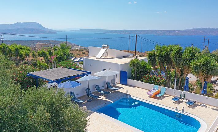 A SUN-DRENCHED HOUSE OVERLOOKING THE SEA