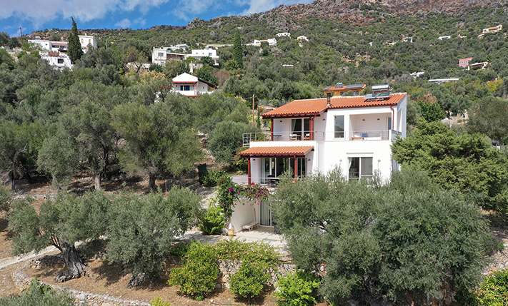 NESTLED IN A LUSH GORGE THAT MEETS THE SEA