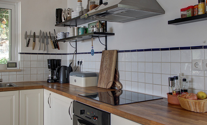 NESTLED IN A LUSH GORGE THAT MEETS THE SEA