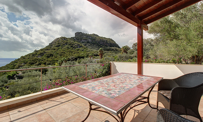 NESTLED IN A LUSH GORGE THAT MEETS THE SEA