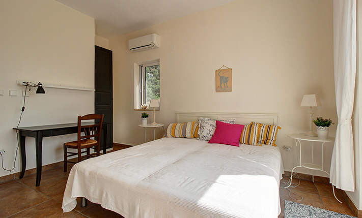 NESTLED IN A LUSH GORGE THAT MEETS THE SEA