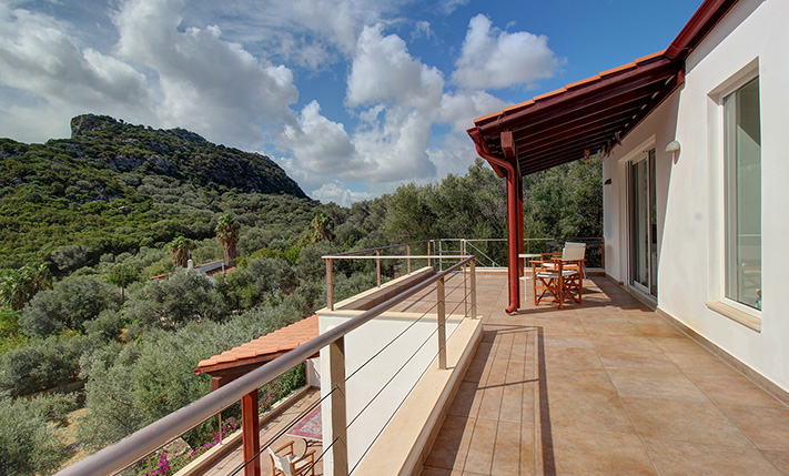 NESTLED IN A LUSH GORGE THAT MEETS THE SEA