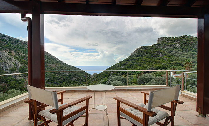 NESTLED IN A LUSH GORGE THAT MEETS THE SEA