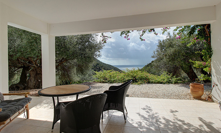 NESTLED IN A LUSH GORGE THAT MEETS THE SEA