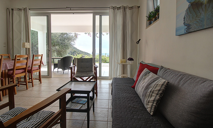 NESTLED IN A LUSH GORGE THAT MEETS THE SEA