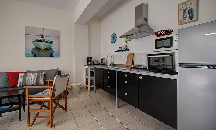 NESTLED IN A LUSH GORGE THAT MEETS THE SEA