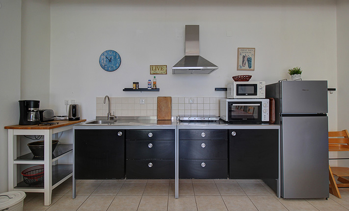 NESTLED IN A LUSH GORGE THAT MEETS THE SEA