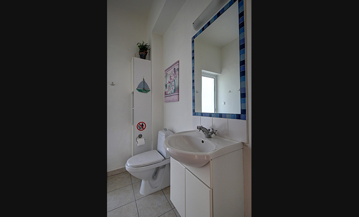 NESTLED IN A LUSH GORGE THAT MEETS THE SEA