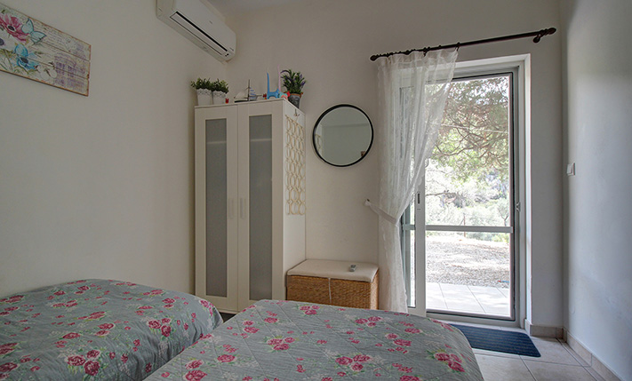 NESTLED IN A LUSH GORGE THAT MEETS THE SEA