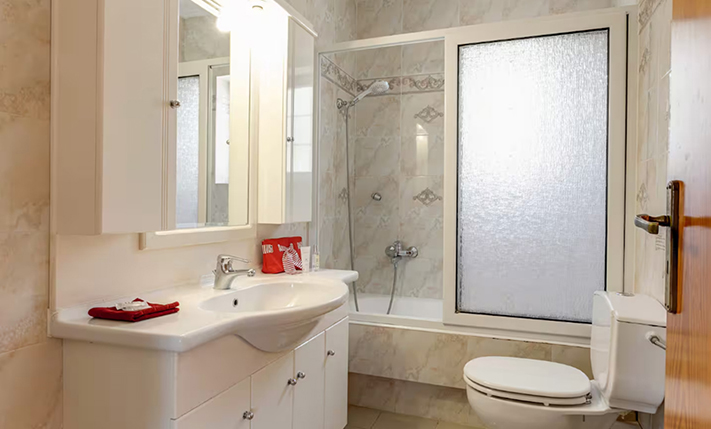 STEPS FROM THE BEACH ON A SPACIOUS PLOT