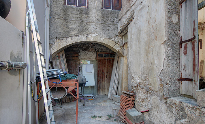 PARTLY RESTORED HOUSE IN KISSAMOS TOWN CENTRE