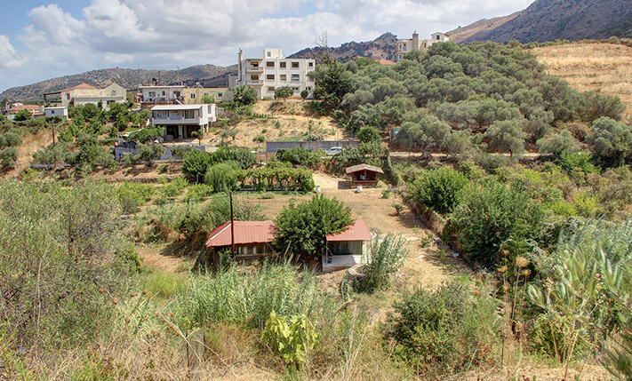WITH A WELL & A VARIETY OF TREES NEAR CHANIA