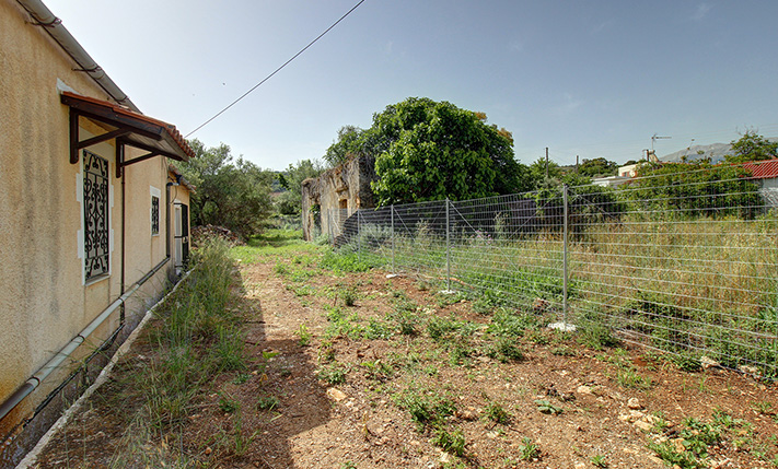 WITH LARGE OLIVE TREES IN THE CENTRE OF ARMENOI